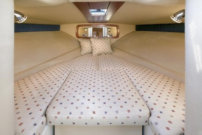 Plush interior and concealed marien head aboard the delightful Corsair 25.  © Bob Wonders